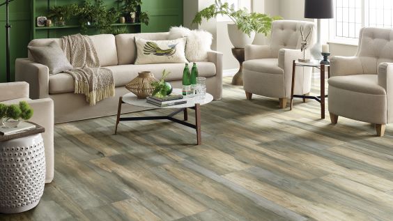 wood look tile flooring in a charming earth-toned living room